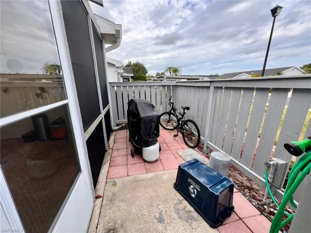Balcony featuring area for grilling