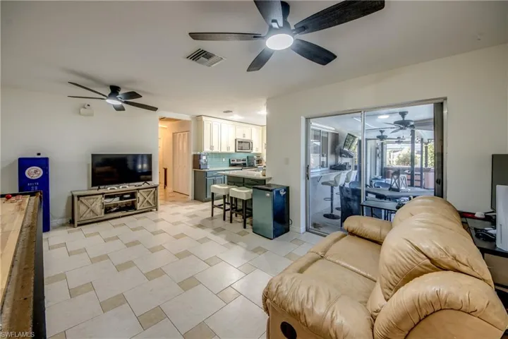 Living area with a ceiling fan