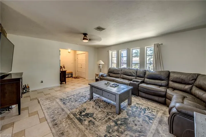 Living area featuring baseboards