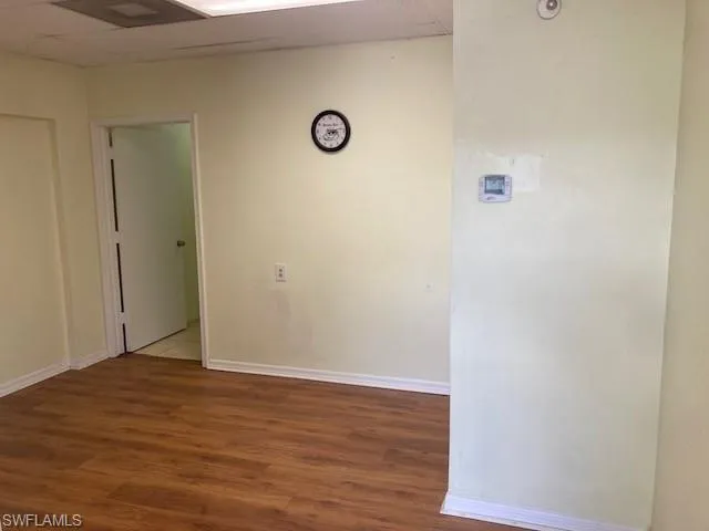 Unfurnished room featuring wood finished floors