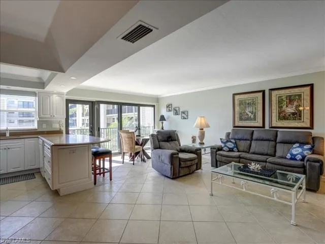 Living room with light tile floors