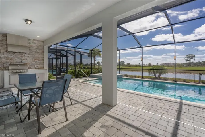 Widest pool area on the street! View of the water to the 4th fairway. No carts driving by your pool!