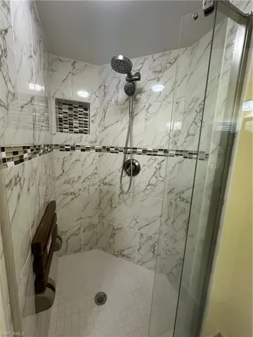 Bathroom with an enclosed shower