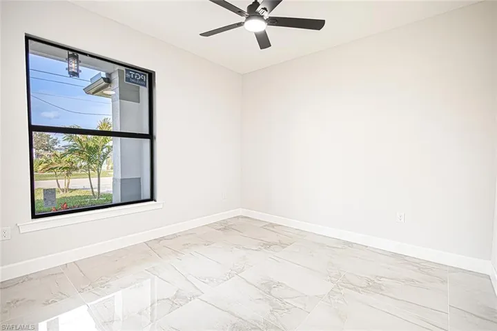 Unfurnished room with ceiling fan