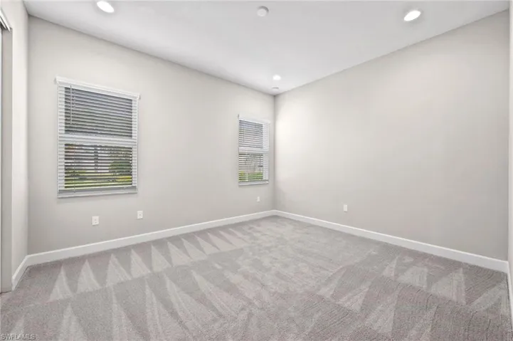 Bedroom 2 in the front right of the home
