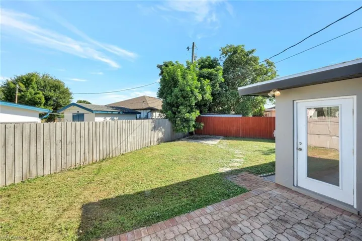 Fenced backyard featuring a patio area