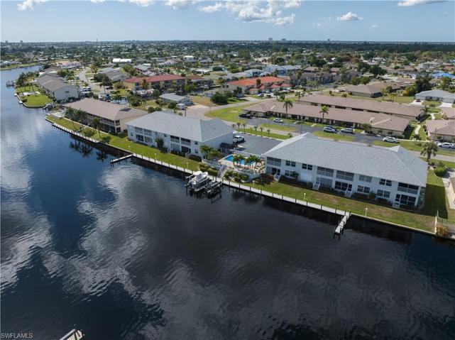 #107 is in the building on the right, 2nd floor, 2nd screened balcony from the pool side.