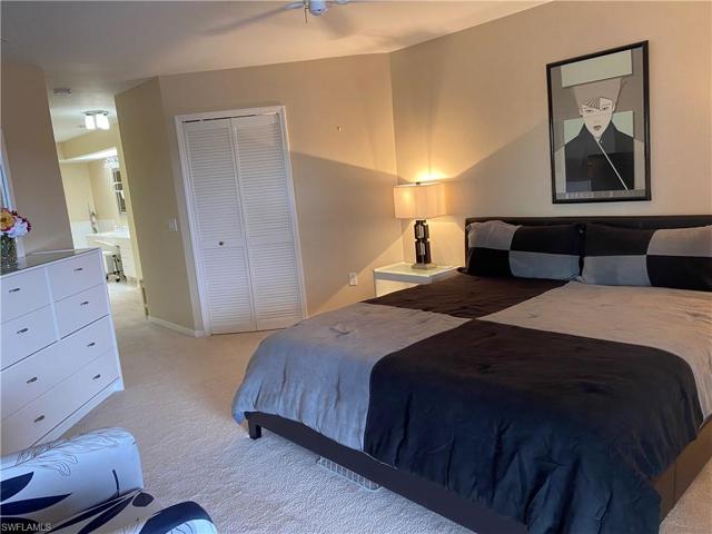 Primary suite with large walk-in closet.
