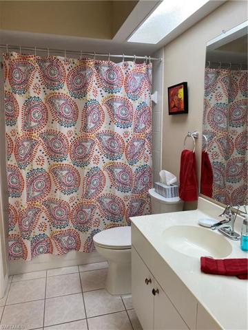 Guest bath has a tub/shower combo.