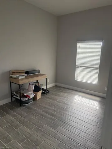 Office area with wood-type flooring