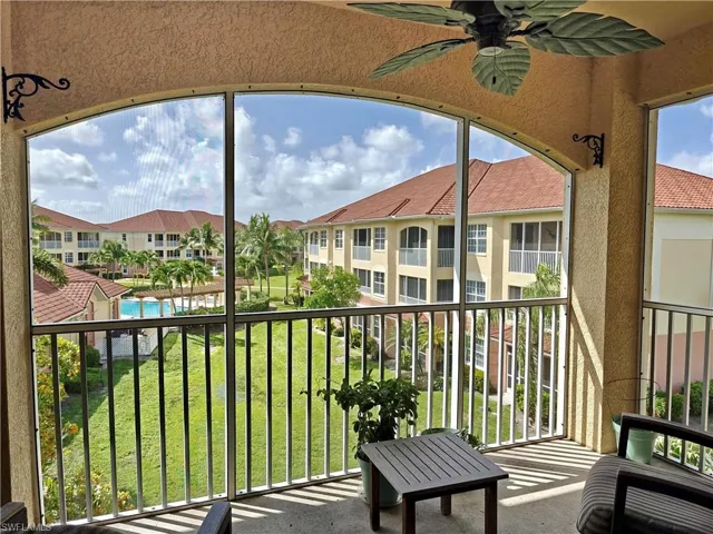 Balcony featuring ceiling fan