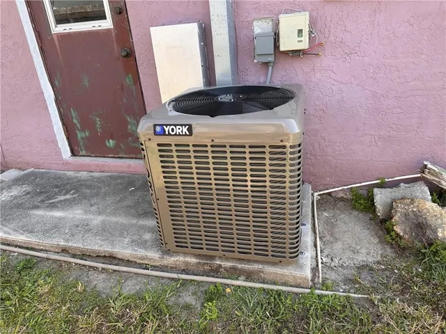 Exterior details featuring central AC