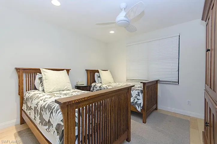 Bedroom featuring recessed lighting, light wood-style floors, and ceiling fan