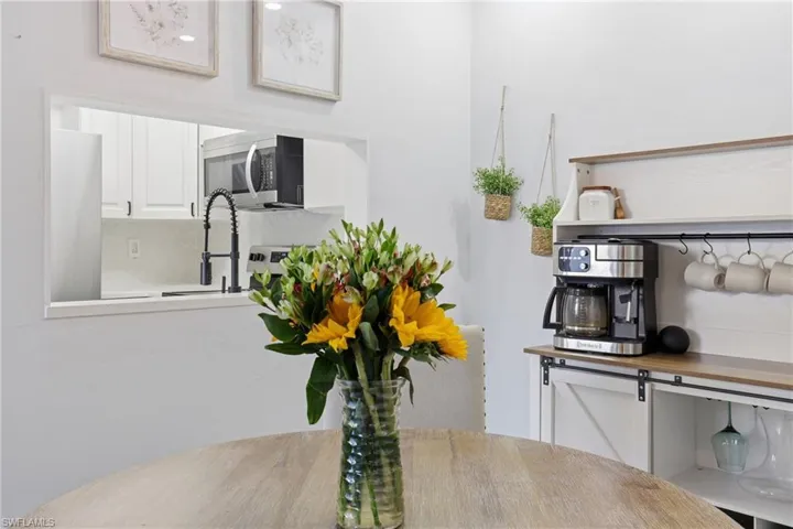 Dining area view of stainless steel microwave