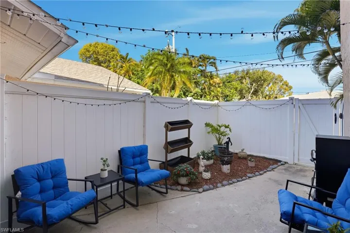 Fenced backyard featuring a patio