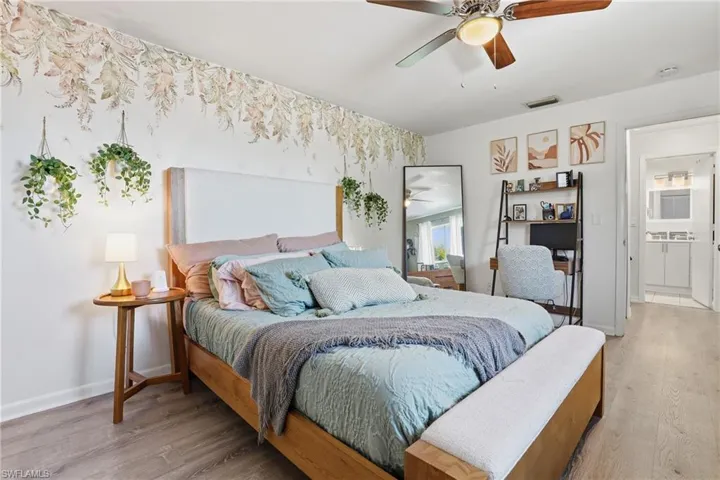 Bedroom featuring light wood-style flooring and ceiling fan