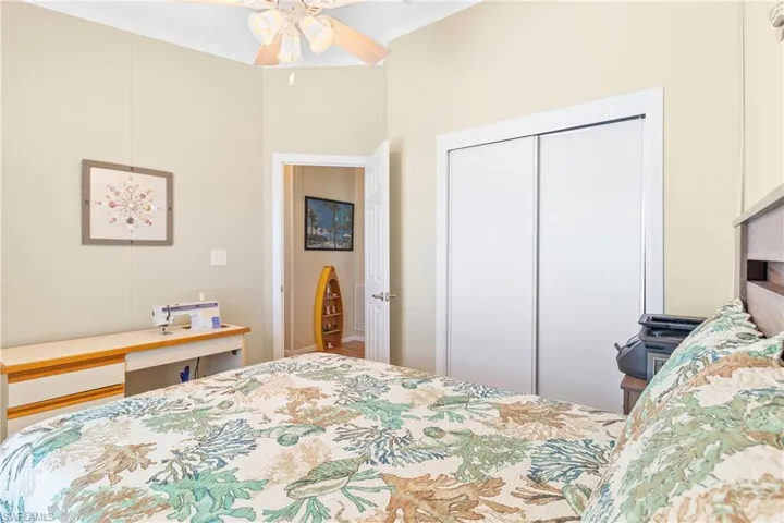 Bedroom featuring a closet and ceiling fan