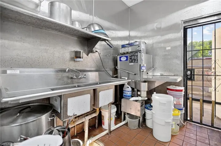 Kitchen featuring tile patterned flooring