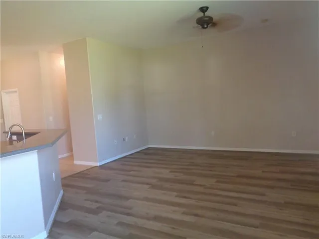 View of the Family Room featuring wood-style flooring and ceiling fan