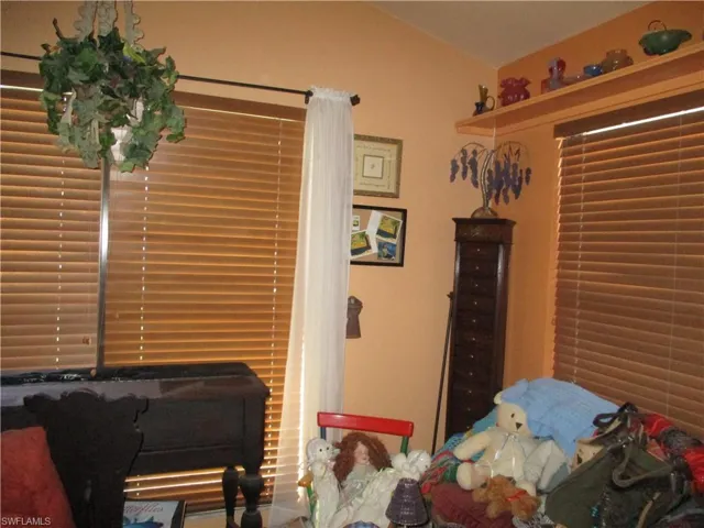 Bedroom with vaulted ceiling