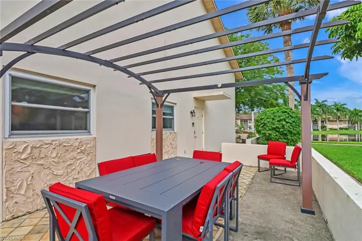 View of patio / terrace featuring outdoor dining space and a pergola
