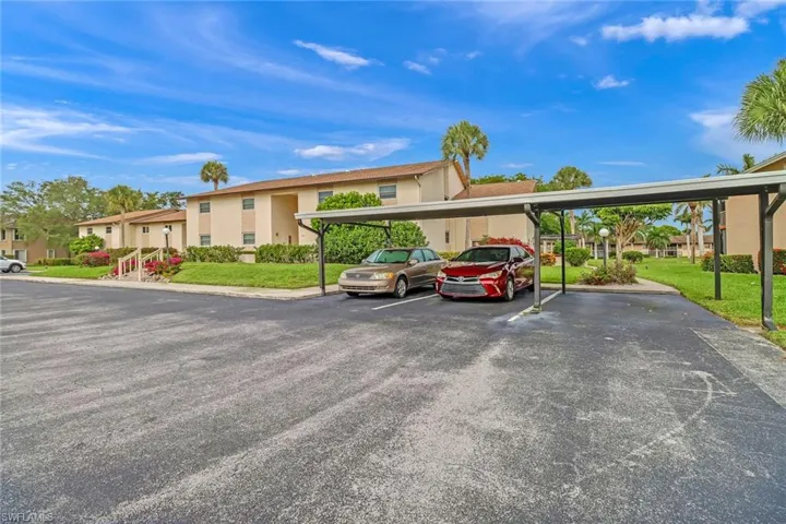 Covered parking lot with a residential view