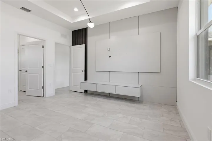 Master bedroom featuring baseboards