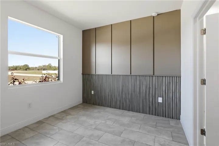 Spare room with an accent wall