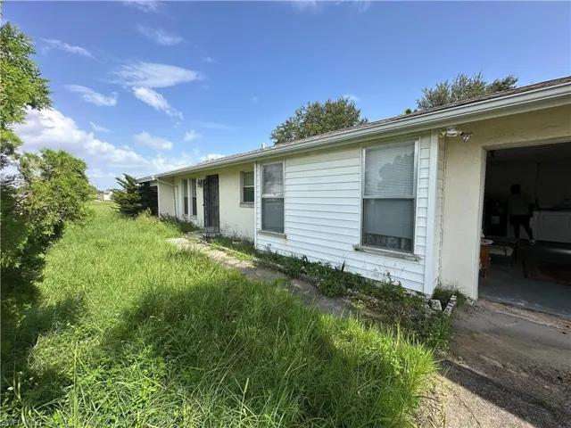 View of property exterior featuring stucco siding