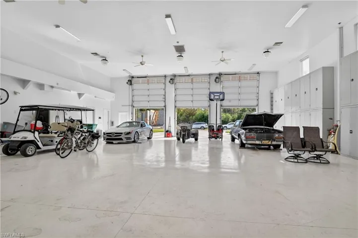 Garage featuring a ceiling fan
