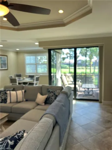 view of dining area, lanai, & golf course
