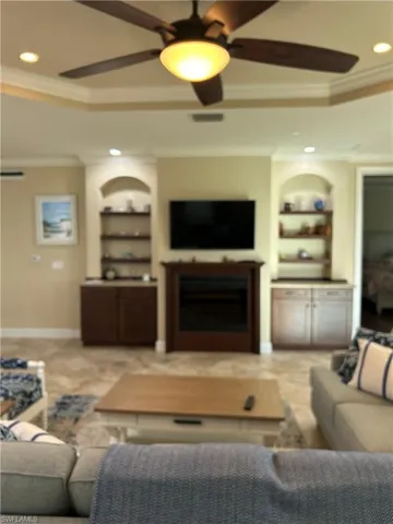 Great room with fireplace & bookcases