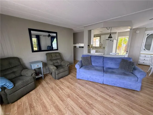 Living area featuring wood finished floors