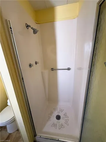 Bathroom with a shower stall