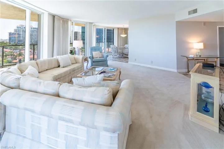 Living room featuring light carpet