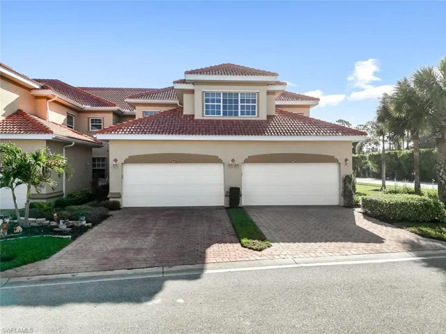 Mediterranean / spanish-style home with stucco siding and decorative driveway
