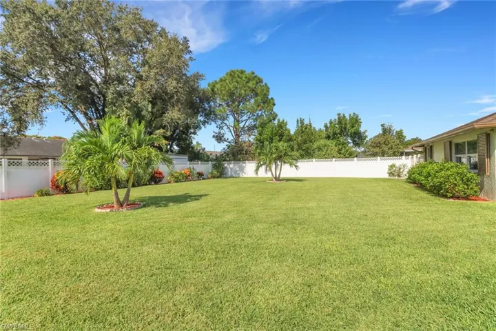 View of fenced backyard