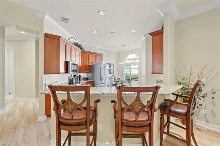 Kitchen peninsula, and stainless steel appliances