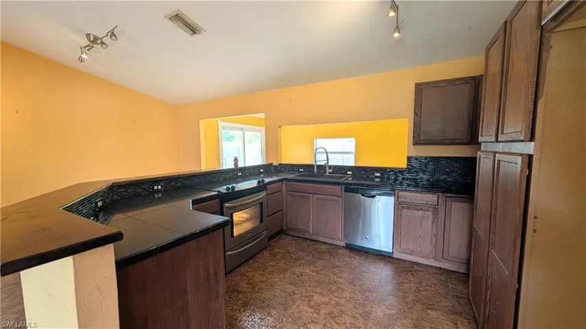521  5th  AVE, Lehigh Acres, FL 33972