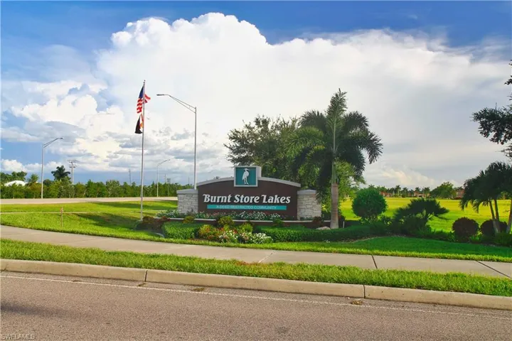 Community sign with a lawn