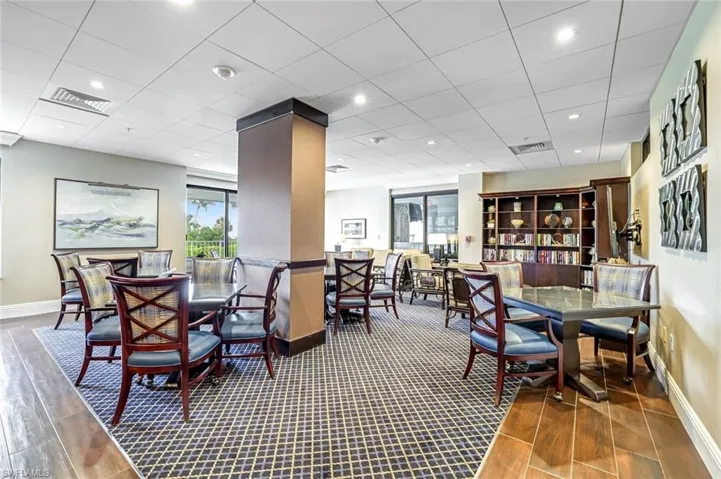 Dining room with baseboards and wood finished floors