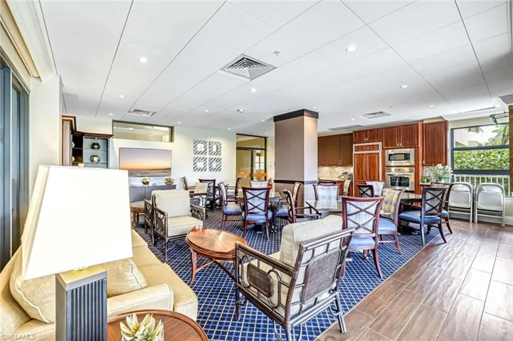 Living room featuring wood finished floors and recessed lighting
