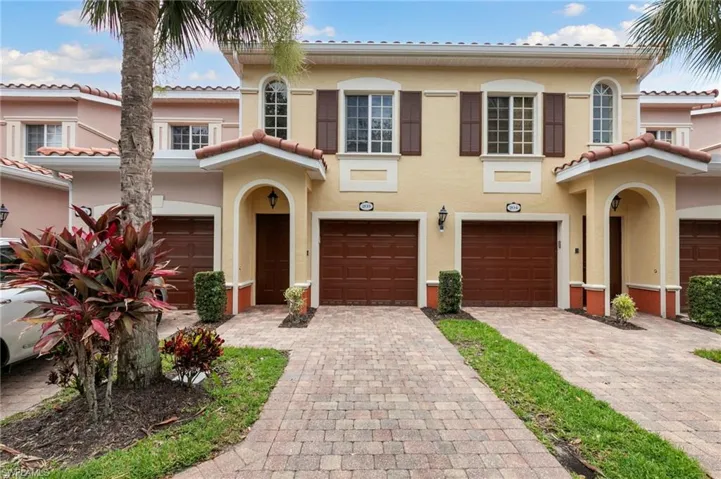 Block paver driveway to the garage enters directly into the home.