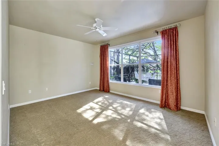 Primary Bedroom overlooking Pool/Spa