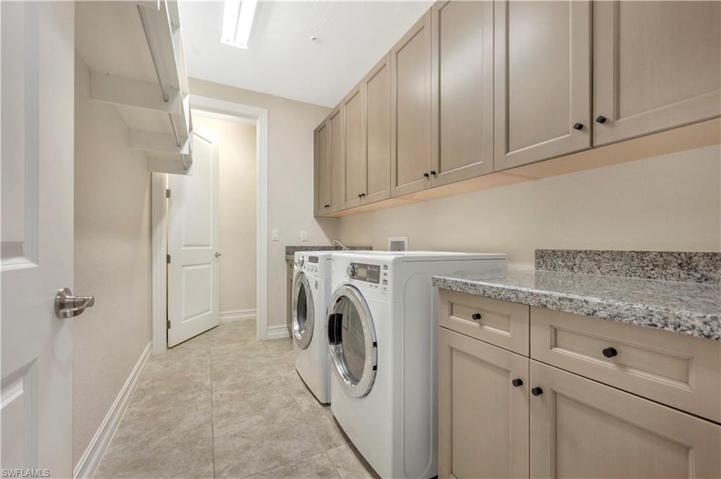 Laundry room with additional storage