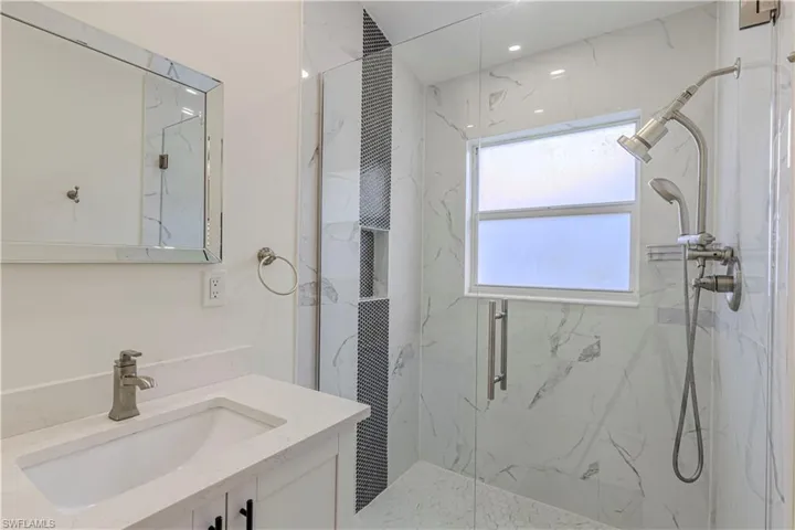Master Bath walk in shower with frameless glass enclosure