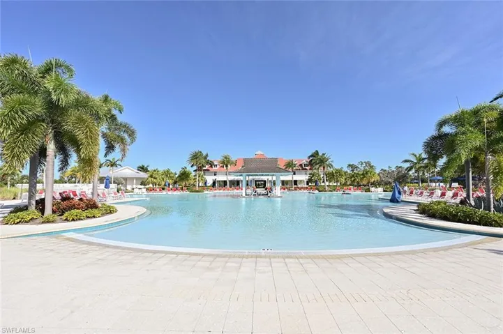 Resort style swimming pool with beach entry