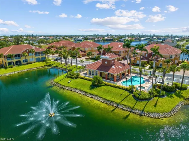 Community Center overlooks lake with water fountain
