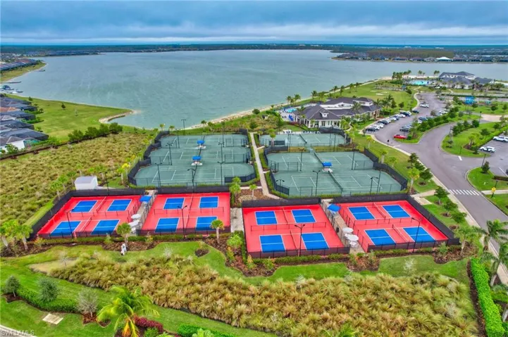 Aerial view featuring 8 Pickleball Courts and 6 har tru Tennis Courts