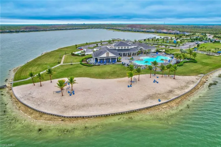 Bird's eye view featuring a beach view and a water view